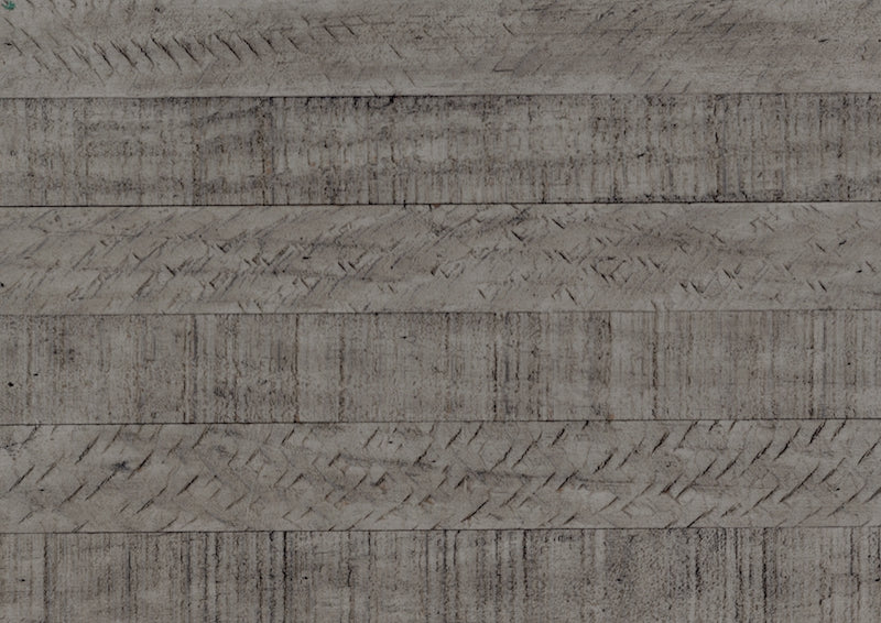 Textured gray surface with a patterned design