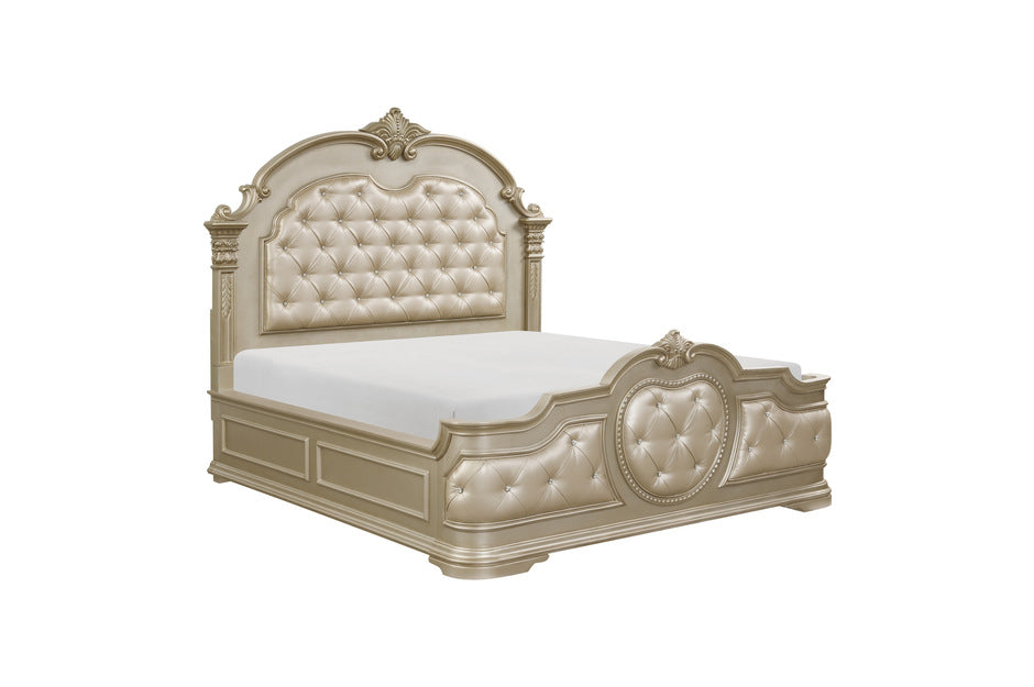 Antoinetta queen panel bed showcasing intricate acanthus leaf carvings, warm cherry veneers, and gold-tipped detailing in a champagne finish.
