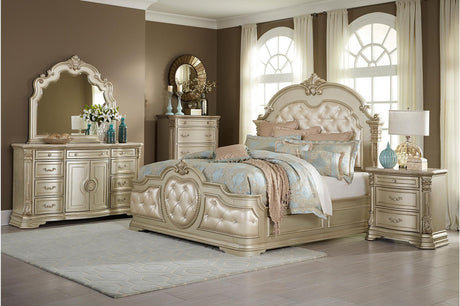 Homelegance Antoinetta 6-piece bedroom set in champagne finish, featuring a queen panel bed, dresser, mirror, and nightstand with ornate carvings and marble accents.