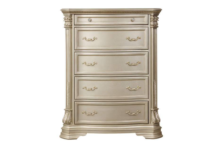 Homelegance Antoinetta chest with six spacious drawers, adorned with bead moldings and sunburst medallion, in a champagne wood finish front.