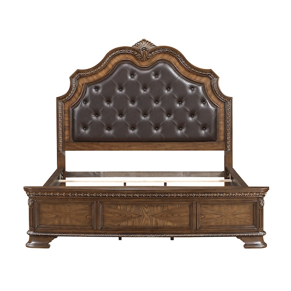 Wooden bed with brown leather headboard on a white background