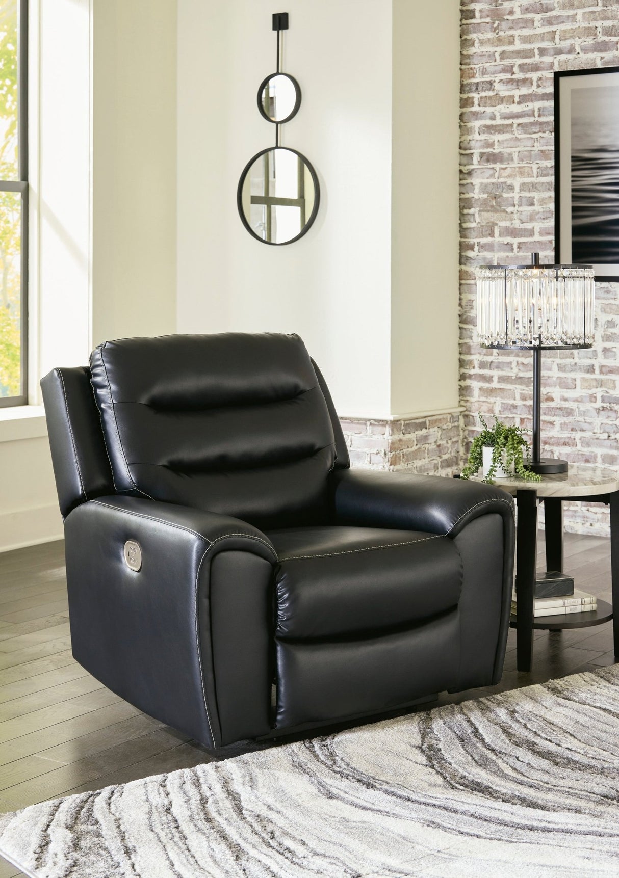 Ashley Black Warlin PWR Recliner/ADJ Headrest - Faux Leather | Home Elegance USA