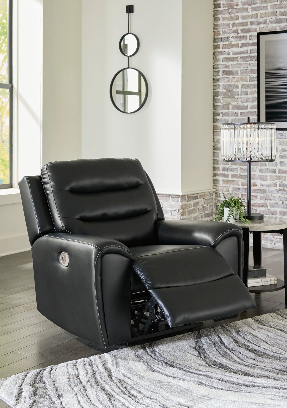 Ashley Black Warlin PWR Recliner/ADJ Headrest - Faux Leather | Home Elegance USA