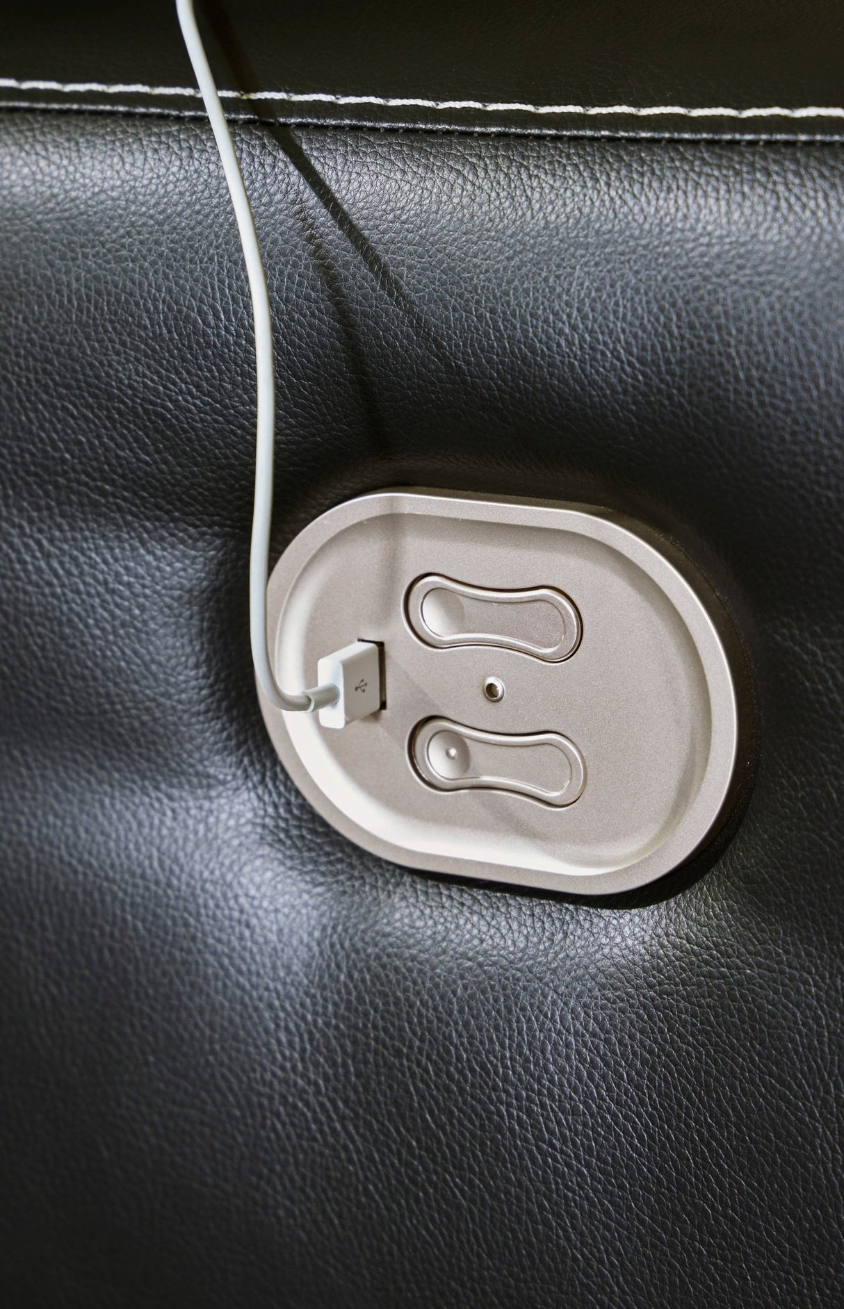 Ashley Black Warlin PWR Recliner/ADJ Headrest - Faux Leather | Home Elegance USA