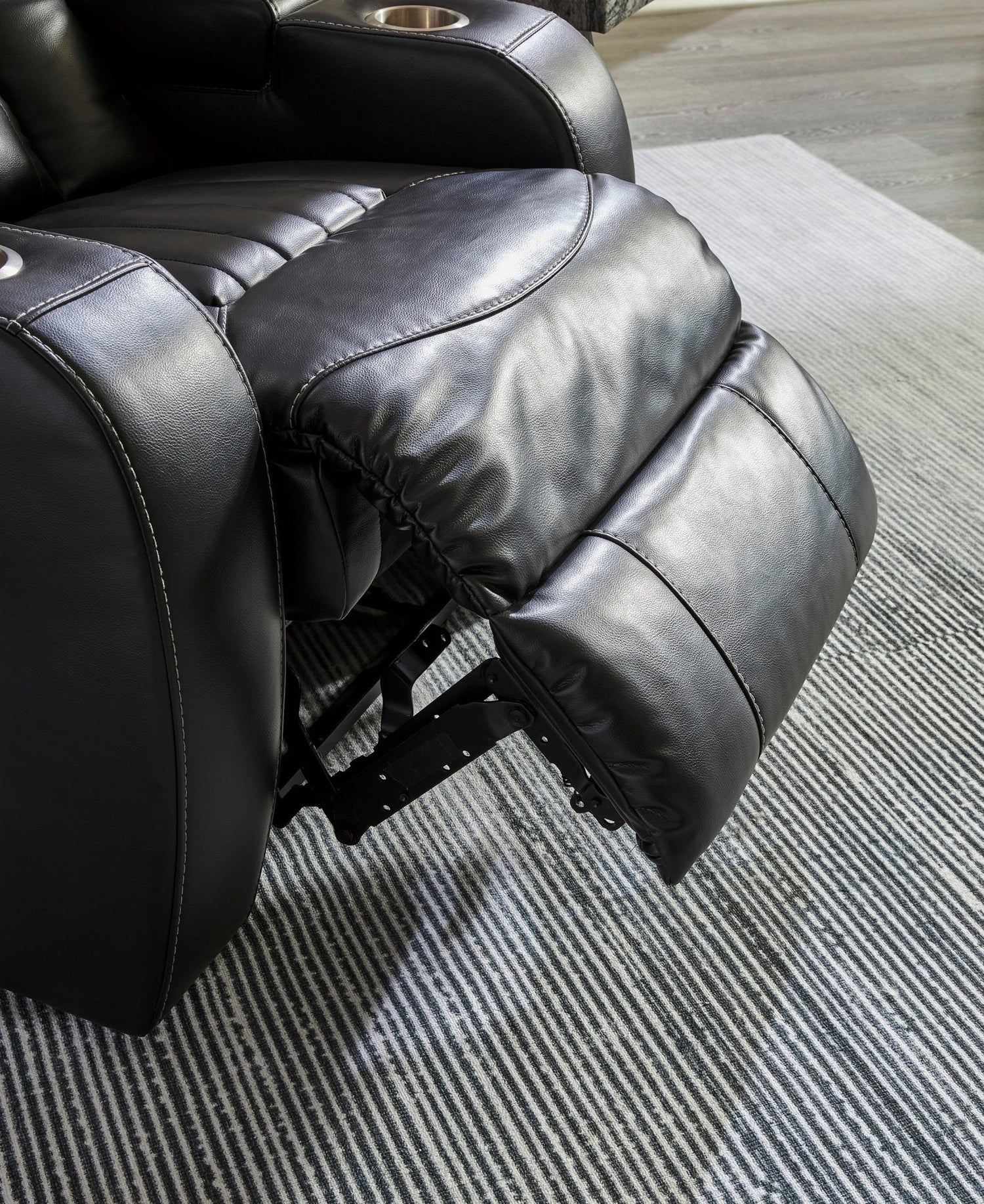 Ashley Midnight Caveman Den PWR Recliner/ADJ Headrest - Faux Leather | Home Elegance USA