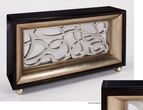 Decorative wall art piece with intricate design in a black and gold frame on a white background
