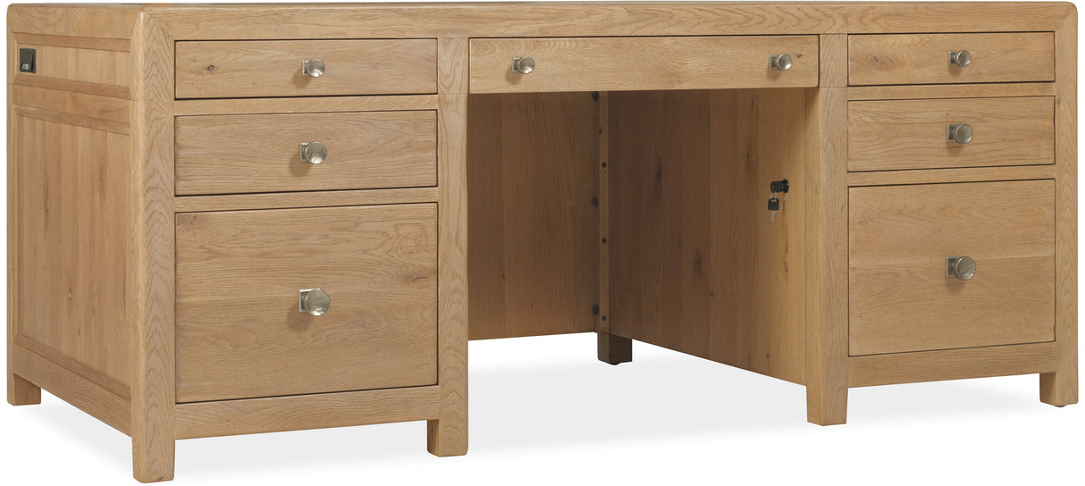 Wooden desk with multiple drawers on a white background