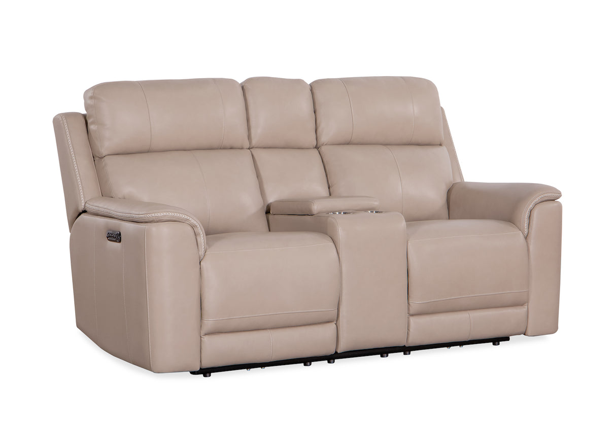 Beige reclining sofa with cup holders on a white background