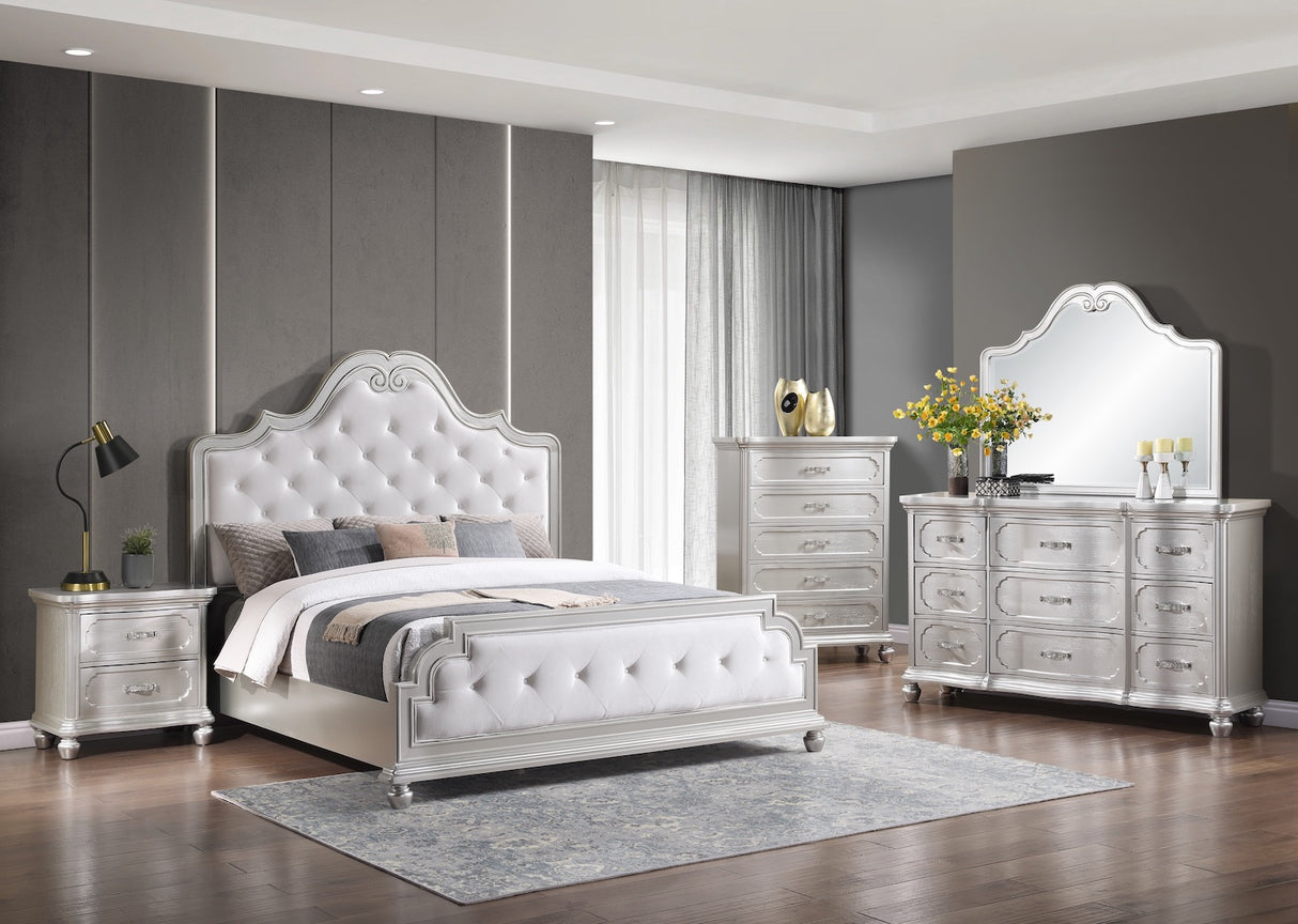 Roma Bedroom Set by Cosmos Furniture in silver finish with tufted headboard. Includes Queen/King bed (HB/FB/rails), dresser 66×18×51, mirror 48×2×40, nightstand 28×18×28, and chest 39×18×51.