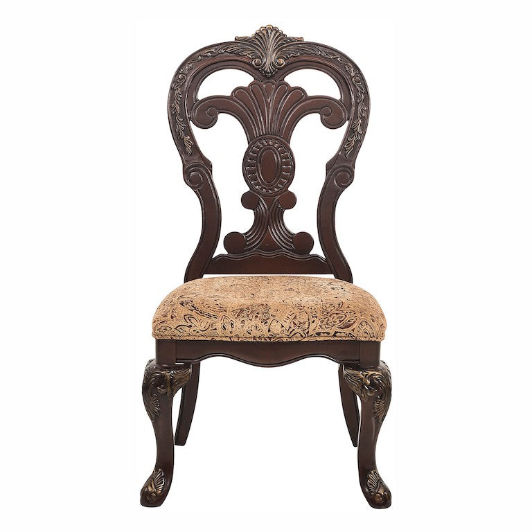 Decorative wooden chair with intricate carvings on a white background