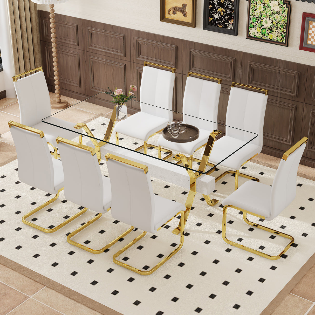 Juego de mesa y sillas. Elegante juego de comedor de vidrio templado transparente - 71'x35.4' con 8 sillas de PU blanco con patas de metal de tubo en C dorado.