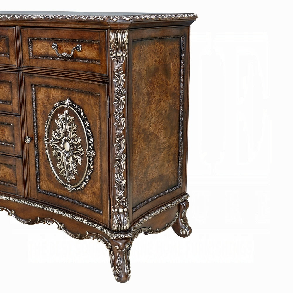 Decorative wooden cabinet with intricate carvings on a white background