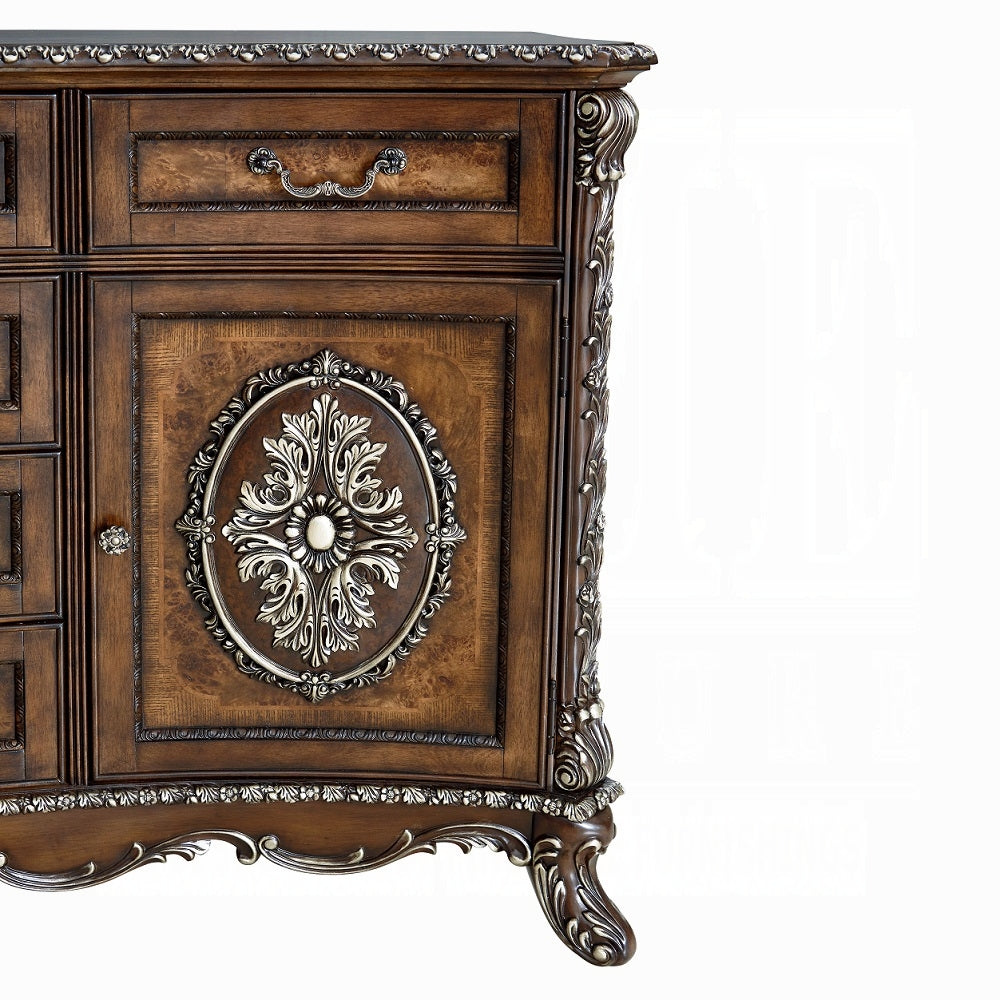 Decorative wooden cabinet with intricate carvings on a white background