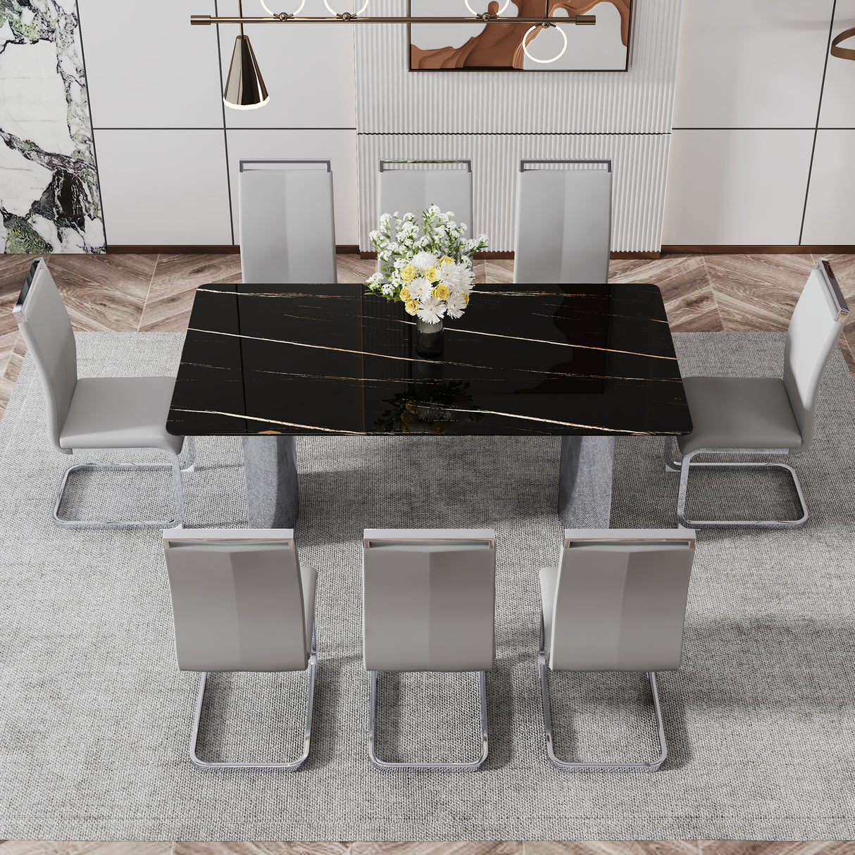 Conjunto de mesa y sillas. La mesa tiene una tapa de cristal con pegatinas de imitación de mármol y patas plateadas de acero inoxidable. Combina con 8 sillas de PU gris claro con patas de metal de tubo en C plateado.