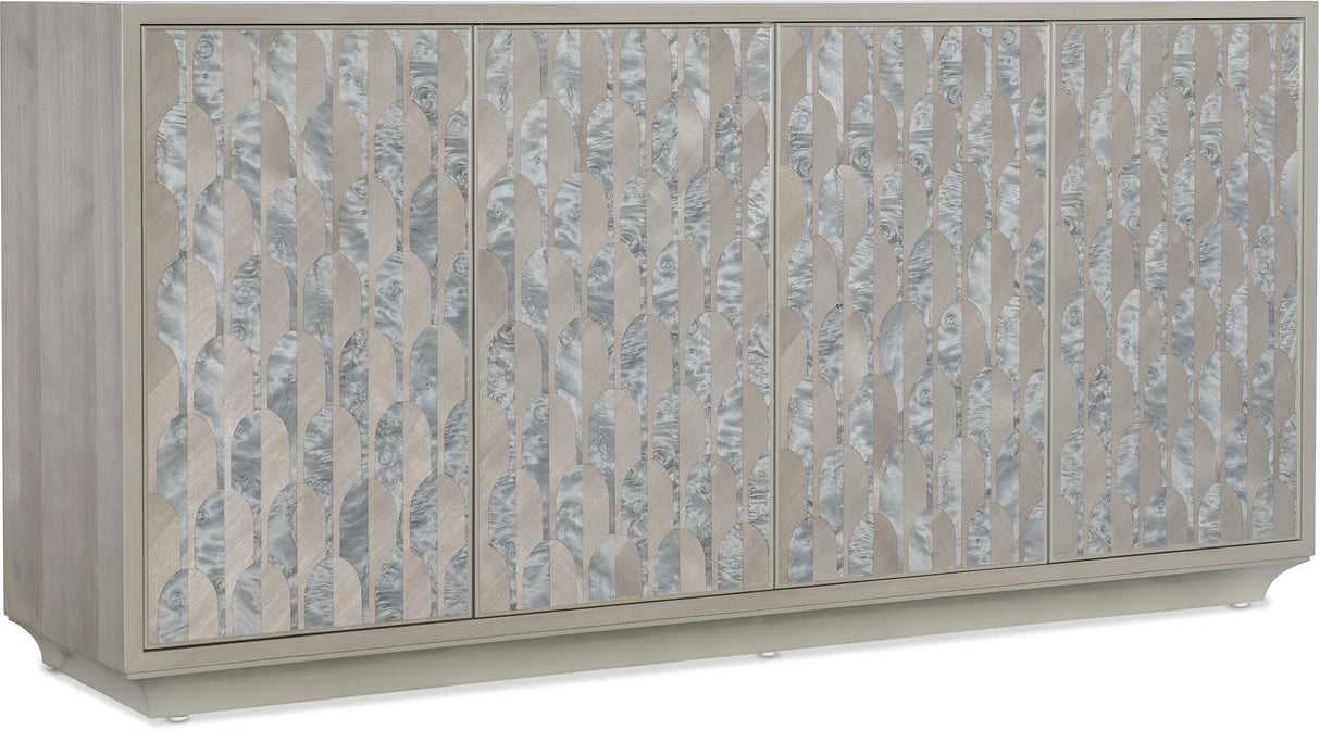 Angle view of Hooker Furniture Melange Emile Credenza in gray with silver burl cutout motifs