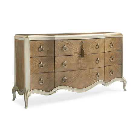 Elegant wooden dresser with multiple spacious drawers, stylish hardware, and a sleek finish for bedroom storage.