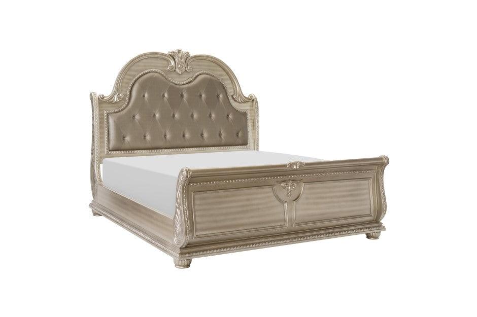 Elegant sleigh bed with a gracefully curved headboard and footboard, adding a touch of classic style and luxury to any bedroom.