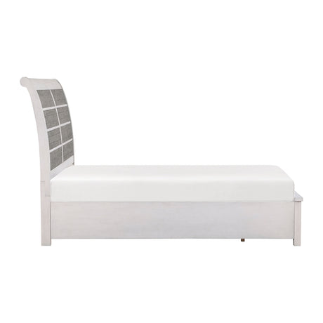 White bed with a decorative headboard on a white background