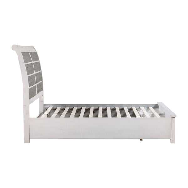 White bed frame with slatted design on a white background