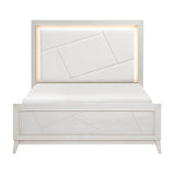 White upholstered bed with geometric design on a white background