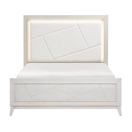 White upholstered bed with geometric design on a white background