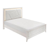 White bed with upholstered headboard on a white background