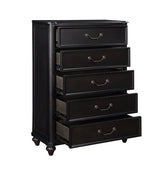 Black dresser with multiple drawers on a white background
