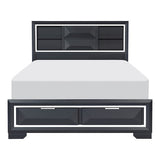 Black metal bed frame with white mattress on a white background