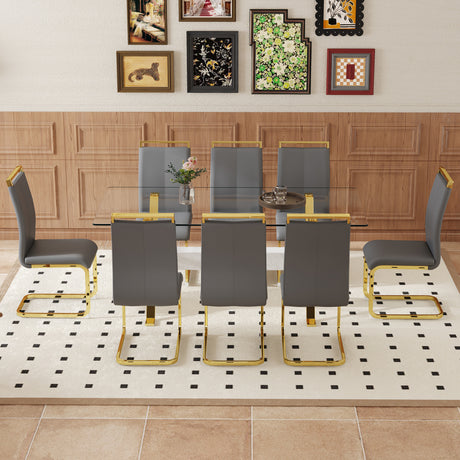 Table and chair set.Elegant Transparent Tempered Glass Dining Set - 71'x35.4' with 8 Dark Gray PU Chairs with golden C-tube metal leg. - sold by Home Elegance USA