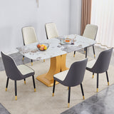 Juego de mesa y sillas. 71'x35.4'x30' Lujosa mesa de comedor de vidrio con diseño Pandora y patas de MDF en forma de C doradas adosadas. Combinada con 6 sillas de PU de color blanco y gris oscuro empalmadas.