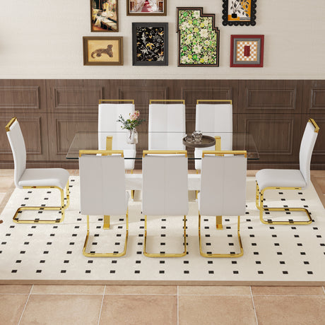 Table and chair set.Elegant Transparent Tempered Glass Dining Set - 71'x35.4' with 8 White PU Chairs with golden C-tube metal leg. - sold by Home Elegance USA