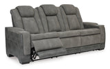 Next-Gen Power Reclining Sofa with Adjustable Headrests in Gray Faux Leather by Ashley