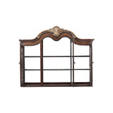 Decorative wooden headboard with intricate carvings on a white background
