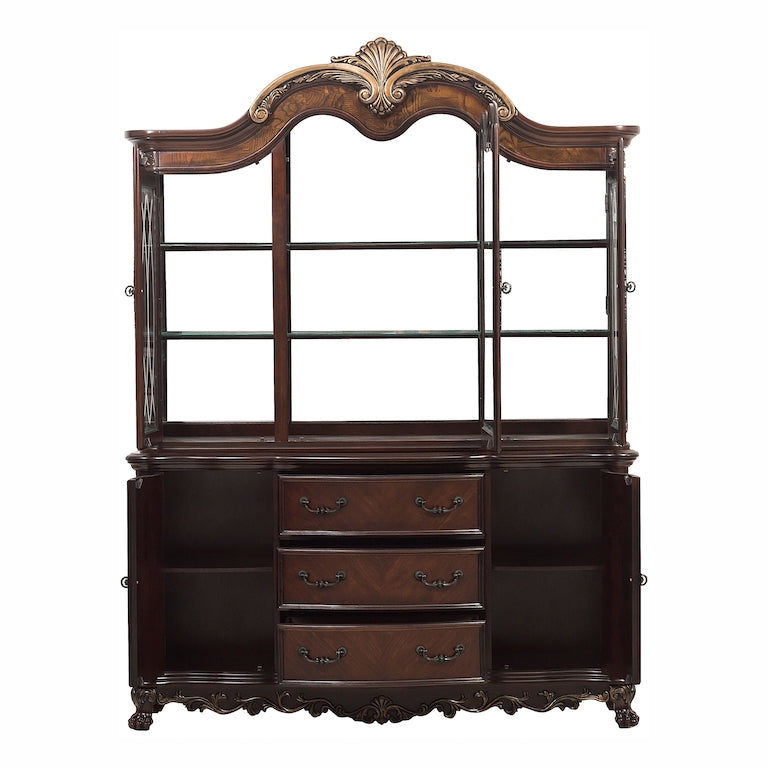 Dark wood dresser with decorative top on a white background