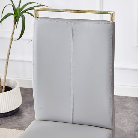 Table and chair set.Elegant Transparent Tempered Glass Dining Set - 71'x35.4' with 8 Light Gray PU Chairs with golden C-tube metal leg. - sold by Home Elegance USA