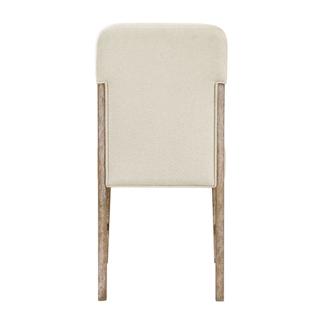 Beige upholstered chair with wooden legs on a white background