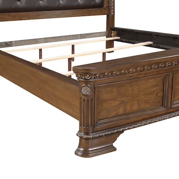 Wooden bed frame with intricate carvings on a white background