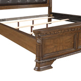 Wooden bed frame with intricate carvings on a white background