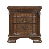 Wooden nightstand with decorative carvings on a white background