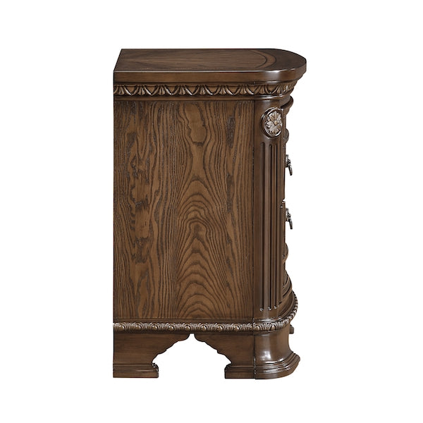 Wooden cabinet with decorative carvings on a white background