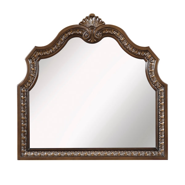 Decorative mirror with ornate brown frame on a white background