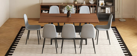 Table and chair set.71*35.4 inch fashionable walnut grain dining table, a practical choice to add color to the home.Paired with 8 Light Gray Linen-Cotton Material High Resilience Dining Chairs. - sold by Home Elegance USA