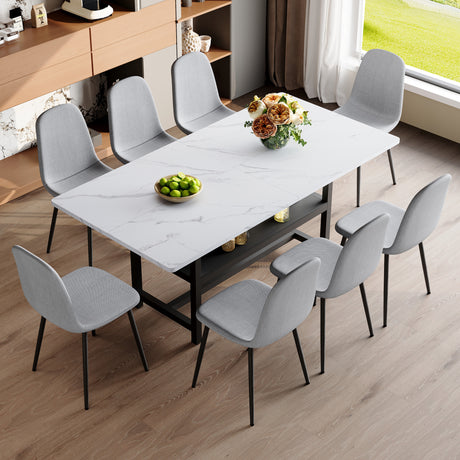 Table and chair set.71*35.4 inch White Grain Spliced Dining Table With Storage Function In The Middle Of The Table Legs.Paired with 8 Light Gray Linen-Cotton Material High Resilience Dining Chairs. - sold by Home Elegance USA