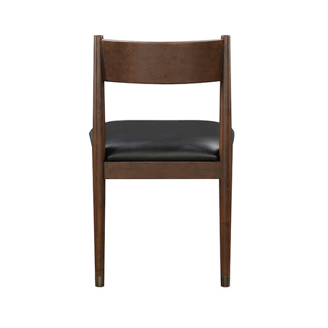 Brown wooden chair with black cushioned seat on a white background