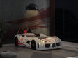 Modern Novelty Style Twin Size Race Car Design Bed Attached Two Magnetic Doors With LED Lights On Wheels And Bottom Upholstery Headboard And Sides White Finish
