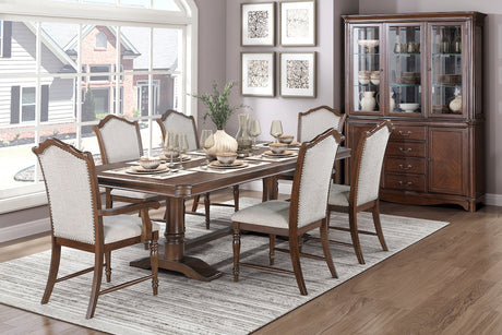 Dining room with wooden table and chairs, and a china cabinet.