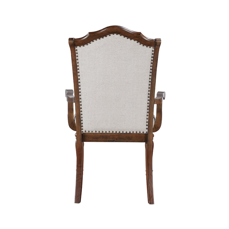 Wooden chair with upholstered seat and backrest on a white background