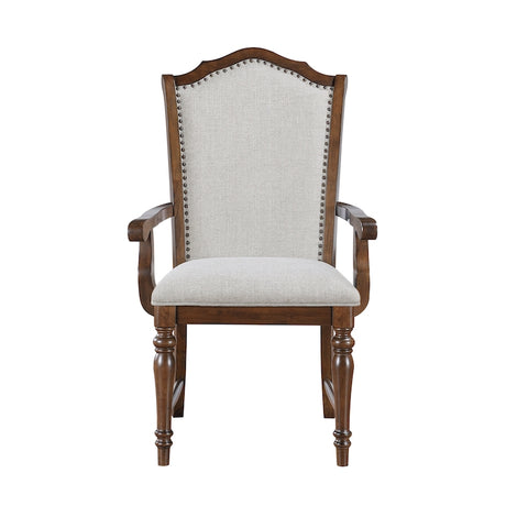 Wooden armchair with upholstered seat and backrest on a white background