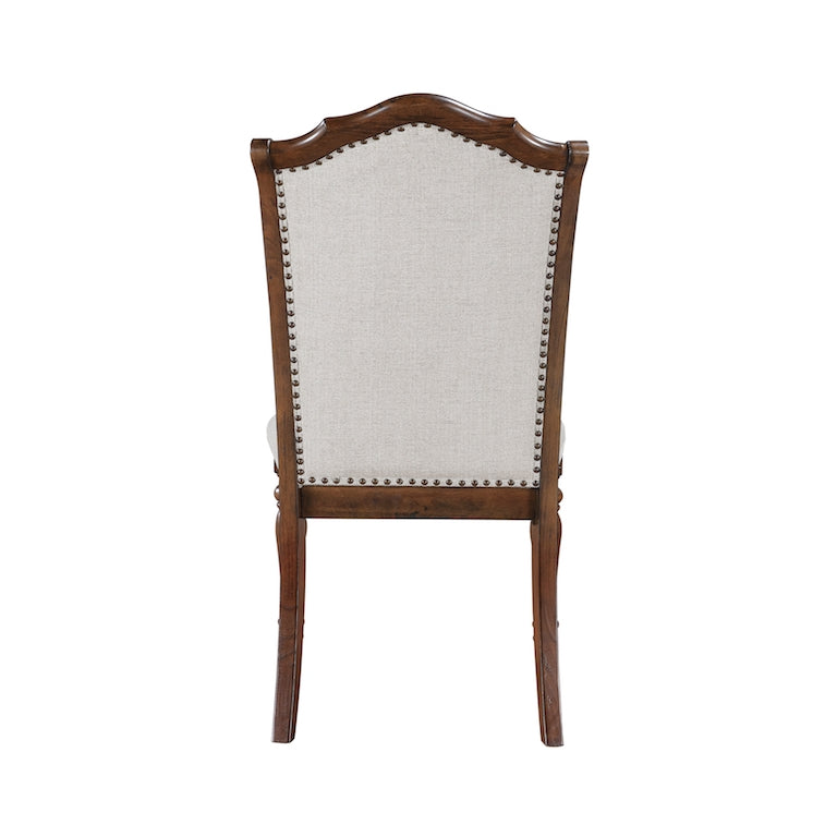 Wooden chair with upholstered backrest on a white background