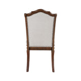 Wooden chair with upholstered backrest on a white background